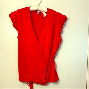 Striking red wrap top